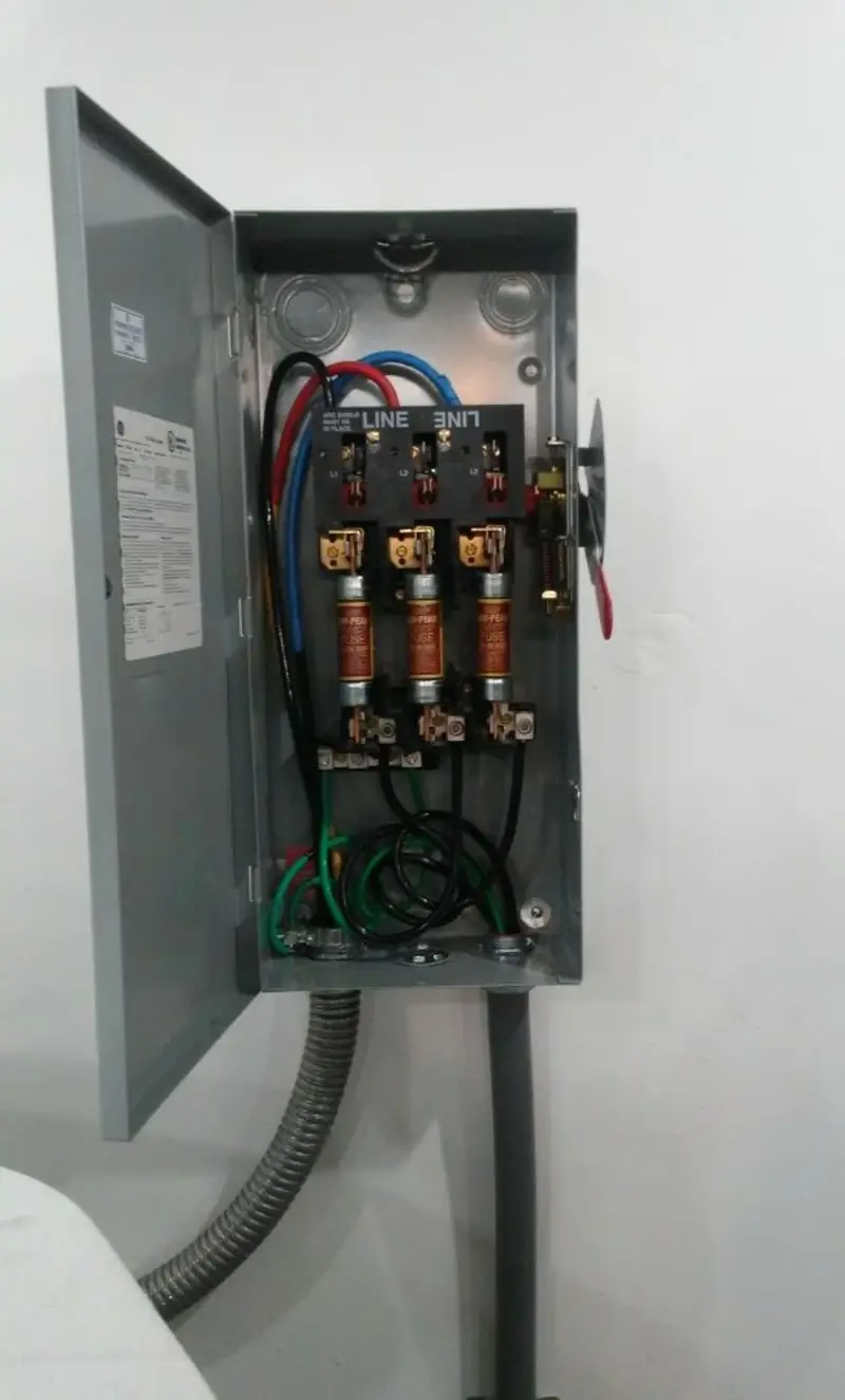 Three-phase disconnect switch installed for Smoke Detector Installation in Sugarmill Woods