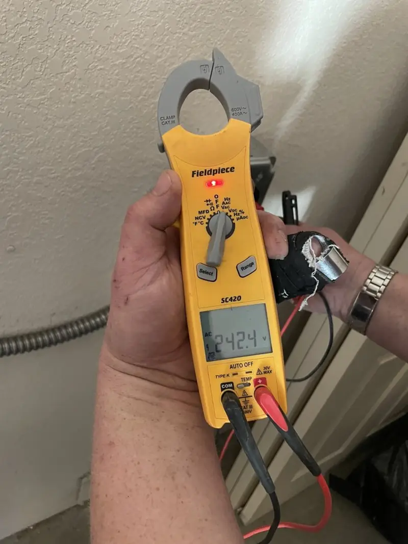 Voltage testing with clamp meter during Electrical Installation Services in Sugarmill Woods